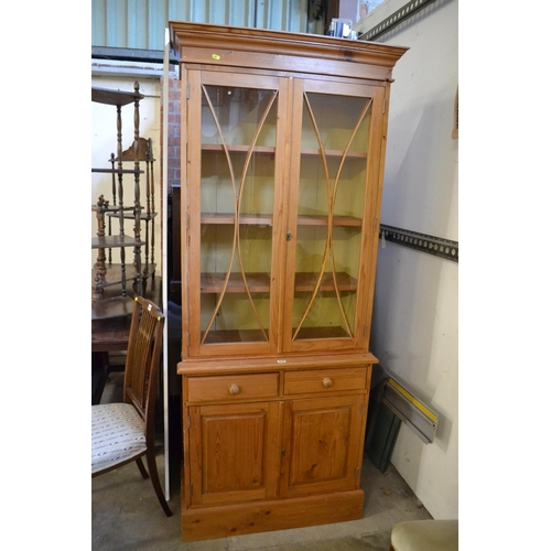 475 - PINE FULL HEIGHT CABINET FITTED 2 DRAWERS AND CUPBOARD UNDER, DISPLAY CABINET OVER