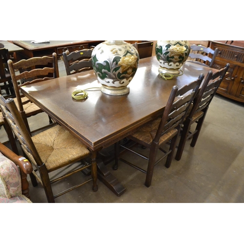 488 - OAK DRAW LEAF REFECTORY DINING TABLE AND SET OF 6 LADDER BACK DINING CHAIRS