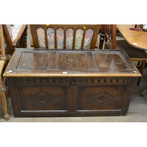 491 - 18TH CENTURY PANELLED OAK COFFER WITH CARVED GEOMETRIC DECORATION  117CM X 54CM X 50CM