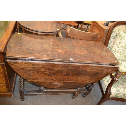 515 - 18TH CENTURY OVAL OAK GATE LEG DINING TABLE ON BARLEYTWIST SUPPORTS AND PLAIN STRETCHERS