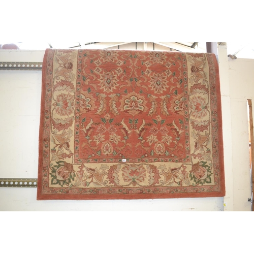 522 - BORDERED ORIENTAL DESIGN RUG 168CM X 245CM