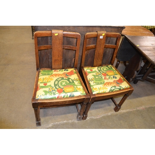 576 - PAIR OF VINTAGE OAK DINING CHAIRS