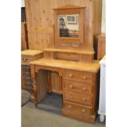 603 - PINE SINGLE PEDESTAL DRESSING TABLE FITTED 4 DRAWERS, SWING MIRROR OVER, FITTED 2 JEWEL DRAWERS