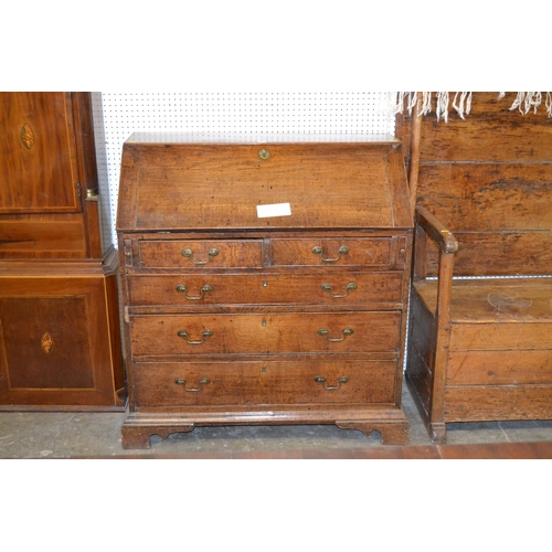 613 - GEORGIAN OAK BUREAU FITTED INTERIOR DRAWERS AND PIGEON HOLES, FALL FLAP, 5 DRAWERS UNDER, DROP BRASS... 