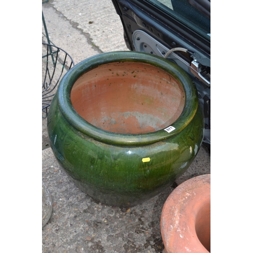 671 - LARGE GREEN GLAZED TERRACOTTA GARDEN POT 50CM HIGH X 50CM DIAMETER