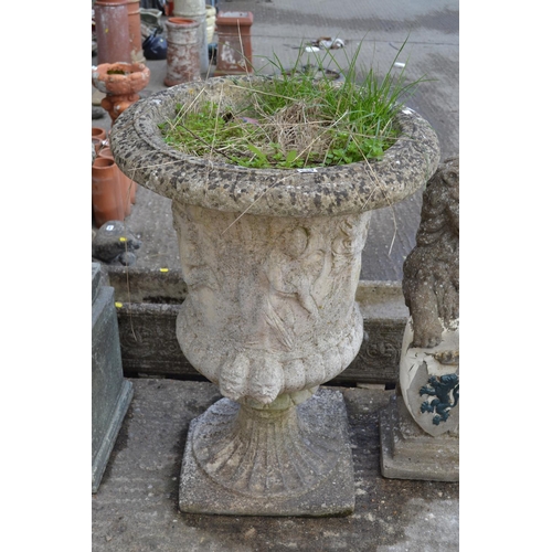 679 - LARGE STONEWARE GARDEN URN EMBOSSED FIGURES 93CM HIGH X 64CM DIAMETER