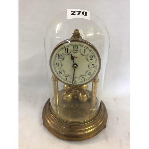 270 - BRASS SKELETON CLOCK IN GLASS DOME