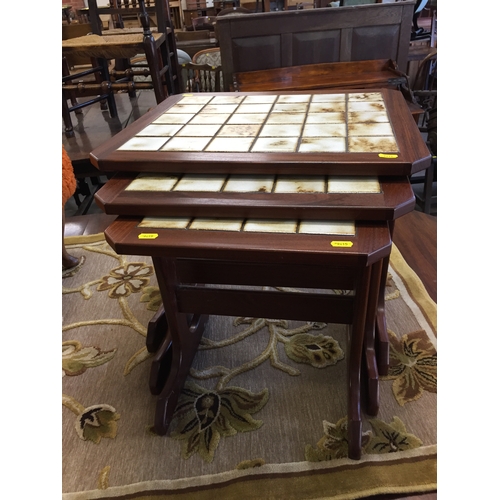 628 - RETRO TEAK TILED TOP NEST OF 3 TABLES