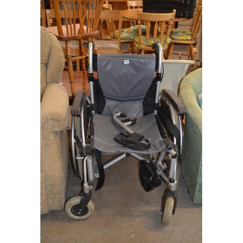 714 - FOLDING WHEELCHAIR