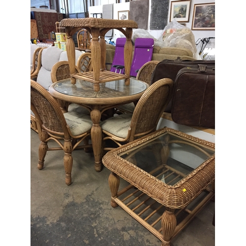 676 - CIRCULAR CANEWORK GLASS TOP CONSERVATORY TABLE (99CM WIDTH X 77CM HIGH), 4 CHAIRS AND 2 COFFEE TABLE... 