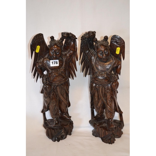 178 - PAIR OF CHINESE CARVED ROSEWOOD WINGED IMMORTALS INLAID WITH SILVER (43CM) (SOME DAMAGE TO WINGS)