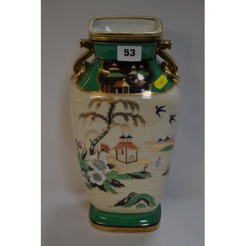 53 - NORITAKE PORCELAIN VASE HAND PAINTED SEASCAPE WITH BUILDINGS, SERPENT HANDLES (32CM)