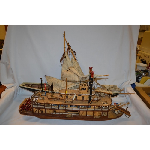 387 - WOODEN MODEL OF MISSISSIPPI SHOWBOAT AND WOODEN MODEL RACING YACHT 