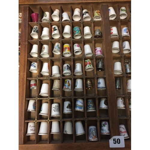 50 - COLLECTION OF 205 CHINA AND METAL THIMBLES DISPLAYED IN OLD PRINTING TRAY