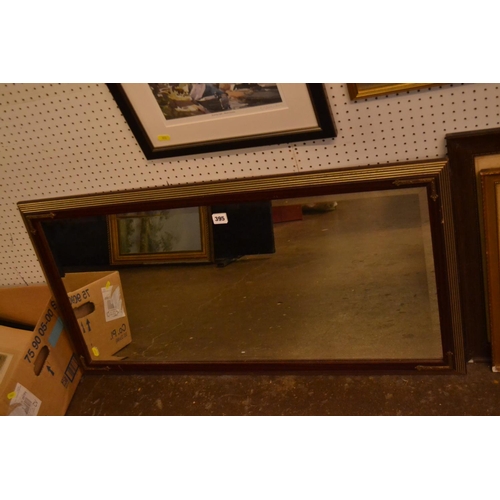 395 - RECTANGULAR BEVELLED GLASS WALL MIRROR IN MAHOGANY AND GOLD FRAME