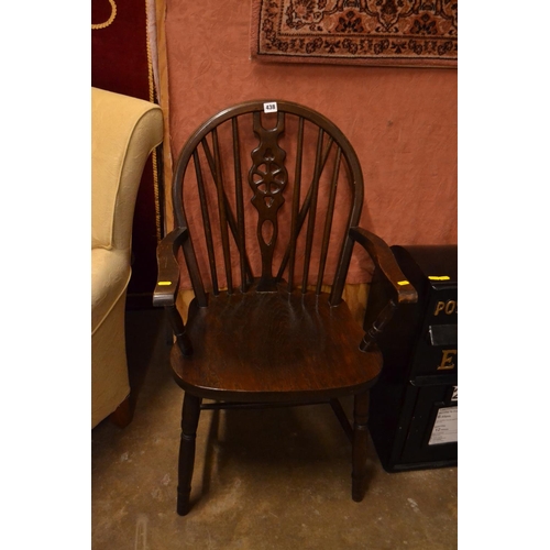 438 - WHEEL AND SPINDLE BACK WINDSOR ARMCHAIR