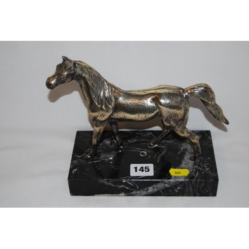 145 - SILVER PLATED FIGURE OF HORSE ON MARBLE PLINTH