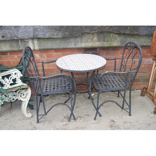 408 - CIRCULAR WROUGHT IRON GARDEN TABLE WITH TILED TOP AND PAIR OF ARMCHAIRS