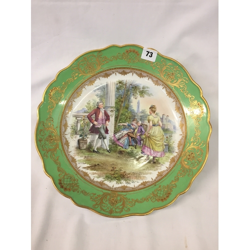 73 - CONTINENTAL RICHLY COLOURED CABINET DISH DECORATED FIGURES IN GARDEN SCENE WITH GREEN GILT BORDER