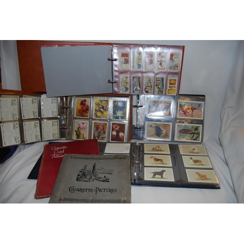 400 - 4 ALBUMS OF CIGAR CARDS, ETC.