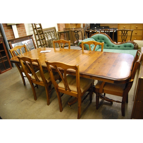 497 - PINE TWIN PILLAR EXTENDING DINING TABLE AND 6 CHAIRS 213CM WIDTH X 93CM DEPTH X 74CM HIGH