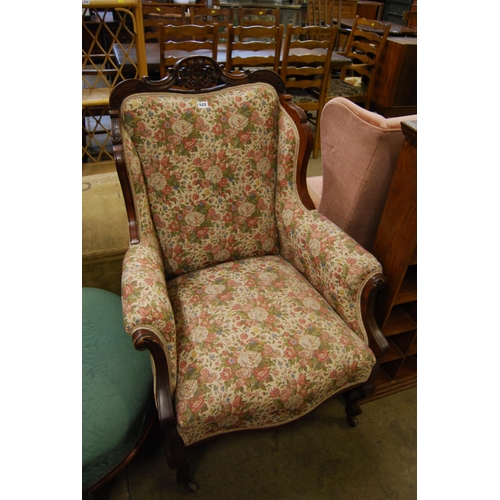 522 - EDWARDIAN CARVED MAHOGANY EARCAP ARMCHAIR ON CABRIOLE LEGS