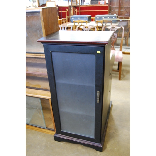 559 - BLACK LACQUERED STORAGE CABINET FITTED 2 SHELVES ENCLOSED BY OPAQUE GLASS PANEL DOOR 54CM WIDTH X 40... 