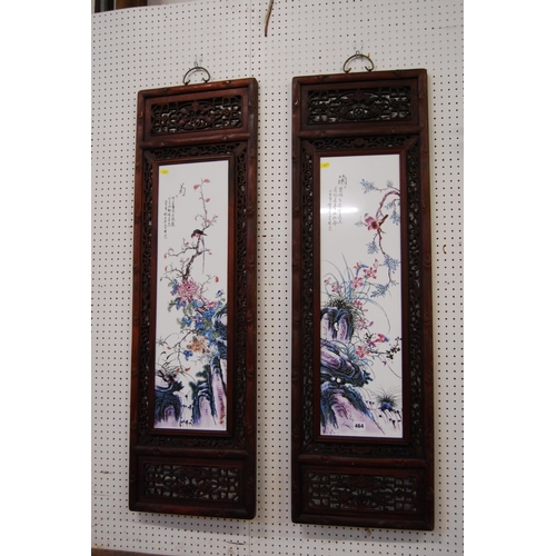 464 - PAIR OF RECTANGULAR CHINESE PLAQUES HAND PAINTED BIRDS AND FLOWERS IN FRETWORK FRAMES