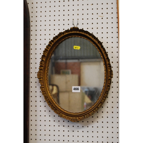 466 - GILT FRAMED OVAL WALL MIRROR