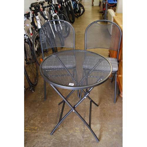 582 - KETTLER CIRCULAR METAL PATIO TABLE AND 2 FOLDING CHAIRS