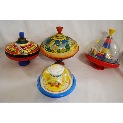 68 - 2 RETRO TINPLATE SPINNING TOPS AN 2 PLASTIC SPINNING TOPS