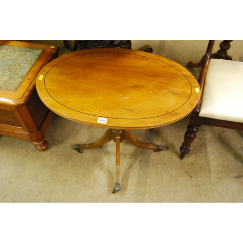 540 - REPRODUCTION OVAL YEW WOOD CENTRE TABLE ON TURNED PILLAR AND QUADRUPLE BASE 67CM WIDTH X 45CM DEPTH ... 