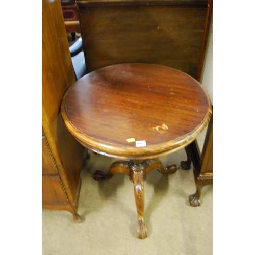 557 - CIRCULAR MAHOGANY WINE TABLE ON TURNED PILLAR AND CARVED TRIPOD BASE 59CM WIDTH X 59CM DEPTH X 66CM ... 