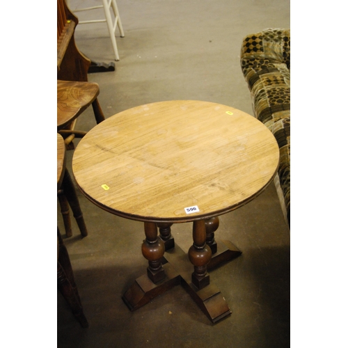 596 - REPRODUCTION OVAL MAHOGANY COFFEE TABLE WITH MAGAZINE SHELVES UNDER