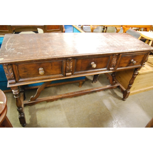 598 - OAK SERVING TABLE FITTED 3 DRAWERS, CARVED ACANTHUS DECORATION, ON TURNED SUPPORTS 150CM WIDTH X 51C... 