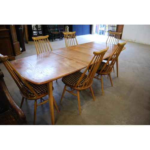 634 - ERCOL GOLDEN OAK EXTENDING DINING TABLE (2 SQUARE LEAVES) (MARKED TOP) AND SET OF 6 SPINDLE BACK DIN... 