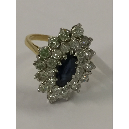 376 - 18CT GOLD RING SET 1 SAPPHIRE AND 26 DIAMONDS (5.45g GROSS) SIZE L