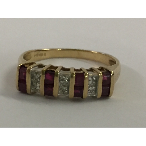 377 - 9CT GOLD RING SET 8 RUBIES AND 6 DIAMONDS (2.9g GROSS) SIZE Q