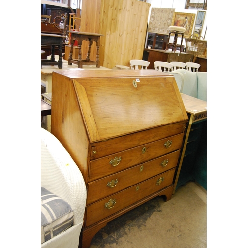 562 - GEORGIAN OAK BUREAU WITH FITTED INTERIOR, SECRET WELL, 3 DRAWERS UNDER, DROP BRASS HANDLES AND ESCUT... 