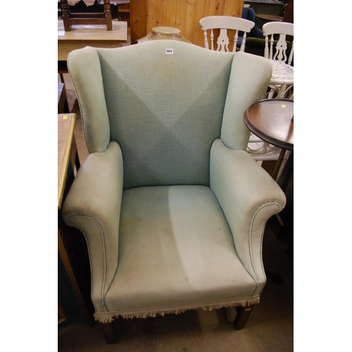 564 - 19TH CENTURY MAHOGANY AND UPHOLSTERED EARCAP ARMCHAIR ON SQUARE SUPPORTS