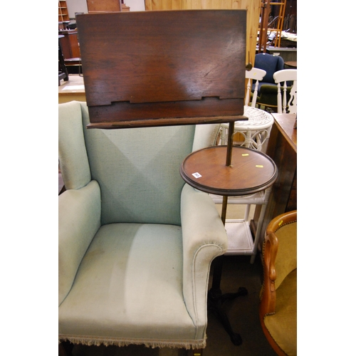 565 - 19TH CENTURY MAHOGANY ADJUSTABLE LECTERN ON COLUMN FITTED CIRCULAR TRAY, ON CAST IRON BASE, BY JOHN ... 