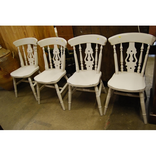 593 - SET OF 4 PAINTED WINDSOR SPINDLE AND PIERCED SPLAY BACK DINING CHAIRS