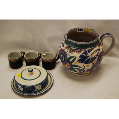 156 - LARGE BULBOUS POOLE POTTERY JUG AND BUTTER DISH & 3 COFFEE CANS