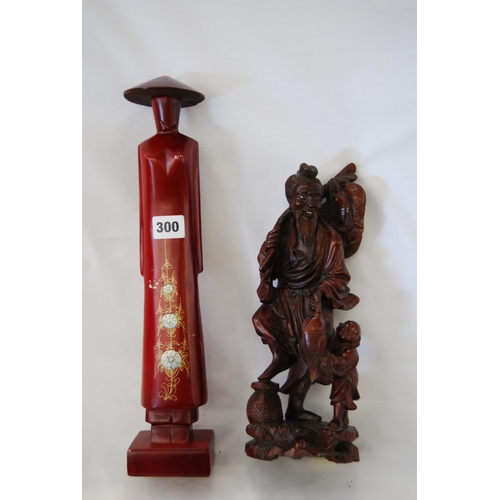 300 - CARVED CHINESE FISHERMAN AND SON AND LACQUERED ORIENTAL FIGURE