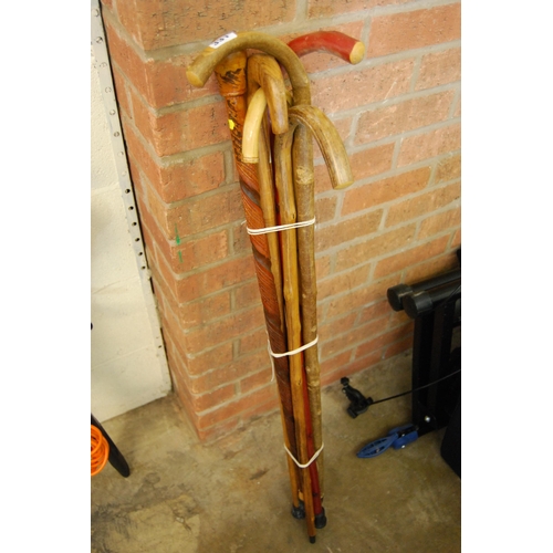 331 - 5 WALKING STICKS AND 1 CANE