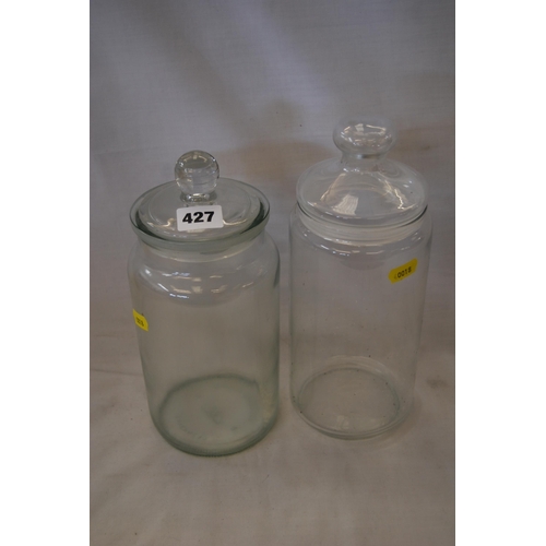 427 - 2 GLASS STORAGE JARS