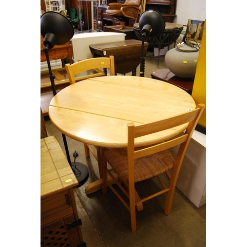 583 - CIRCULAR BREAKFAST TABLE AND 2 CHAIRS