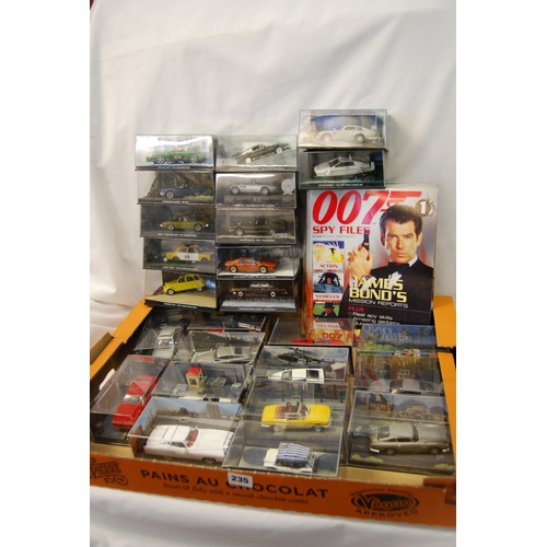 235 - COLLECTION OF 25 JAMES BOND 007 MODEL DIE CAST CARS INCLUDING 31 007 MAGAZINES