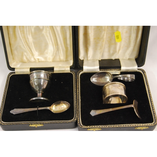 403 - 2 SILVER CHRISTENING SETS ONE WITH SERVIETTE RING, SPOON & PUSHER & OTHER ONE EGGCUP & SPOON