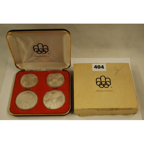 404 - SET OF FOUR 1976 CANADIAN OLYMPIC SILVER COINS IN CASE